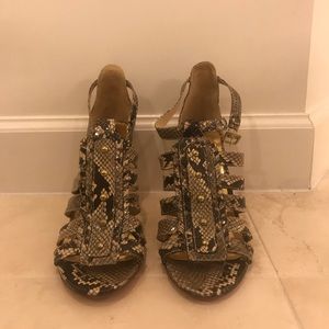 Size 9 Coach Snake skin heels